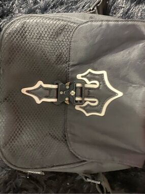 Classic Black Women's Backpack with Decorative Buckle